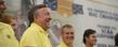 Golf Coach Herb Page, along with the golf team, is congratulated during a special ceremony at the Field House before Thursday's football game. Page led the Kent State Golf Team to a national 5th place.