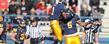 Kent State Golden Flashes Darius Polk and Roosevelt Nix celebrate a touchdown against Ohio University during the final home game this season.