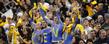 Kent State Golden Flashes fans celebrate a score during the 2012 Mid-American Conference (MAC) Championship game at Ford Field in Detroit.