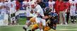 Kent State linebacker C.J. Malauulu (43) and defensive back Josh Pleasant (2) sack the Miami Redhawks quarterback during the first half of the Homecoming game at Dix Stadium.