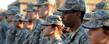 Members of Kent State's U.S. Army ROTC Cadet Corps stand at attention during the university's 2010 observance of Veterans Day.