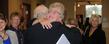 Emeritus Professor and donor Judy Devine hugs former Athletic Director Laing Kennedy at the dedication of the Athletic Resource Center in the Memorial Athletic and Convocation Center.