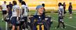 Marissa Manocchio, a Kent State student who is battling cancer, was named honorary captain of the Kent State football team for the 2010 season. At a recent practice, the team presented her with an autographed jersey.