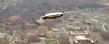 The Goodyear blimp Spirit of Goodyear flies over Kent State University during the ESPN Tip-Off Marathon game, broadcasting images of Kent State to a national audience.