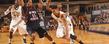 Kent State guard Michael Porrini drives to the basket against a player from Robert Morris during the current season.