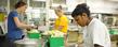 Kent State students volunteer at the Campus Kitchen at Kent State by preparing food in Beall Hall.