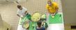 Kent State students chop vegetables in the kitchen in Beall Hall as part of the Campus Kitchen at Kent State.