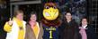 Kent State employees show their team spirit with Flash, the university’s mascot, as they enter the MAC Center for a send-off event as the football team heads to the Mid-American Conference championship game in Detroit.