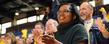 Kent State faculty, staff and students, as well as community members, cheer as the football team enters the MAC Center for a send-off event as the Golden Flashes head to Detroit for the Mid-American Conference championship game.