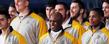 Members of the Kent State football team and Kent State head football coach Darrell Hazell (center) receive applause and cheers from the crowd in attendance at the Mid-American Conference championship send-off event held in the MAC Center.