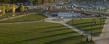 Pictured is the Student Green, as seen one week prior to its dedication from the roof of the Kent Student Center. Located at the heart of the campus, the new Student Green is a place for students to relax, study and enjoy. It also provides outdoor programming space to student organizations on campus and offers a performance stage that is intended to support student use.