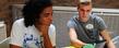 Two Kent State students study before class in the Business Administration Building.