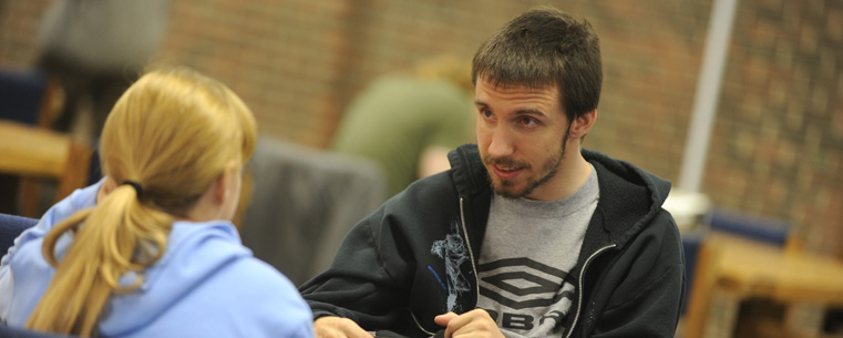 Students at Kent State University at the Geauga Campus relax in a commons area before class.