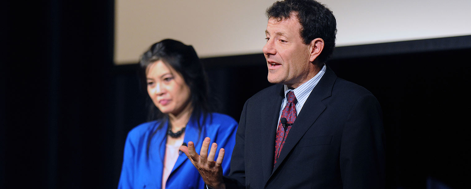 Pulitzer Prize-winning journalists Sheryl WuDunn and Nicholas Kristof speak during the Presidential Speaker Series in the Kent Student Center Ballroom.