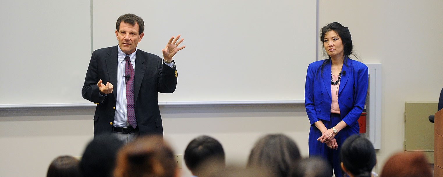 Pulitzer Prize-winning journalists Sheryl WuDunn and Nicholas Kristof respond to questions from students in the School of Journalism and Mass Communication during a presentation in Franklin Hall.