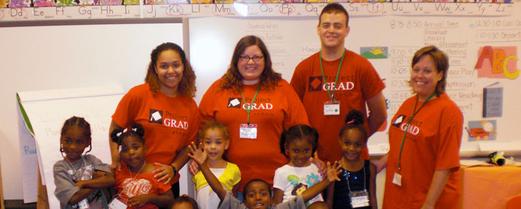 Kent State students Megan McKinley (American Sign Language Major), Heather Rebis (Early Childhood Education), Andrew Flounders and Kent State Associate Professor Janice Kroeger (Early Childhood Education) pose for this photograph with kindergarten children involved in the Bridges to Kindergarten project. (Photo courtesy of Janice Kroeger, Kent State University.)<br />