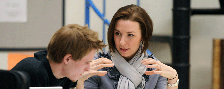 Kent State University Assistant Professor Jillian Lindner works with a student on a visual design project. Kent State has been named one of the 2011 “Great Colleges to Work For.”