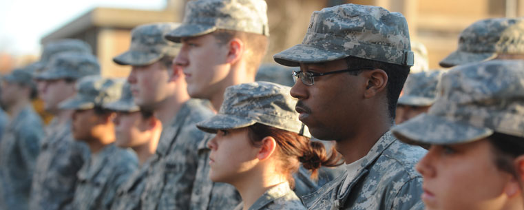 Members of the Kent State Army ROTC stand at attention during the campus’ observance of Veterans Day.