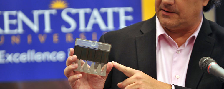 Dan Minardi, president of Crystal Diagnostics, shows one of the cassettes used to detect pathogens.