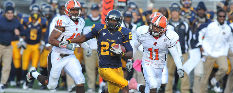 Kent State running back Jacquise Terry gains some yards against Bowling Green during Saturday's game.