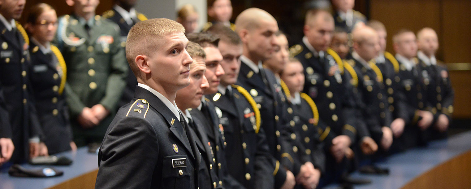 Members of Kent State’s Army ROTC program watch as two of their members are commissioned into the U.S. Army.