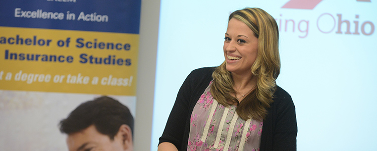 Katelyn Moore, the first Kent State student to declare the insurance studies major, speaks during a press conference about career opportunities in the insurance industry and the university’s new insurance studies degree program.