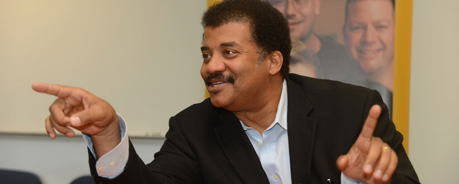 Astrophysicist Neil deGrasse Tyson speaks to members of the local media during a press conference on Sept. 25. Tyson came to the university to speak at the third Kent State University Presidential Speaker Series.