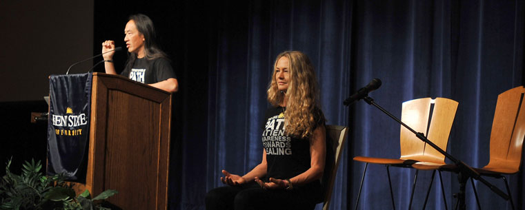 Yoga experts Rodney Yee and Colleen Saidman Yee give a yoga demonstration during the opening of the Kent State University College of Nursing’s annual conference series.