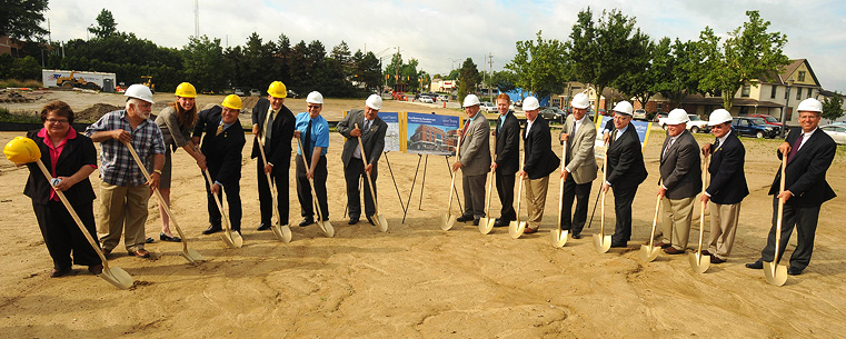 <p>Partners in the downtown Kent redevelopment project, including Kent State University President Lester A. Lefton, along with elected officials gathered Aug. 9 for a groundbreaking ceremony. The $100 million facelift to downtown Kent represents a unique public-private partnership.<br />
</p>