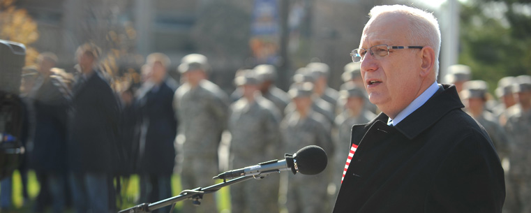 <p>Kent State University President Lester A. Lefton speaks during Kent State University's annual Veterans Day ceremony held on Risman Plaza.</p>