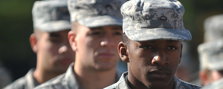 Members of Kent State University's Army Cadet Corps stand at attention during the 2011 Veterans Day service held on Risman Plaza.