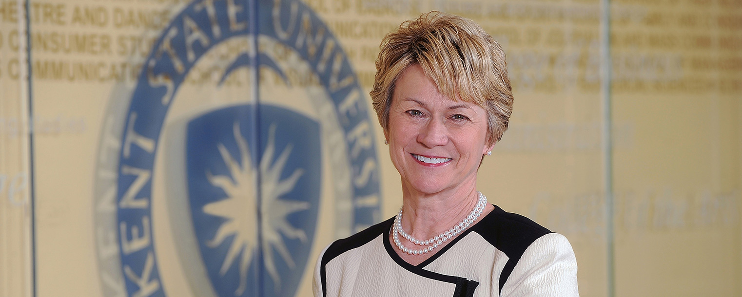 Beverly Warren, Kent State’s 12th president, stands outside the executive offices in the University Library.