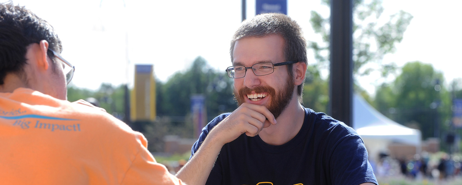 Members of the Kent State Chess Club enjoy a game while attending the 32nd Annual Black Squirrel Festival on Risman Plaza.