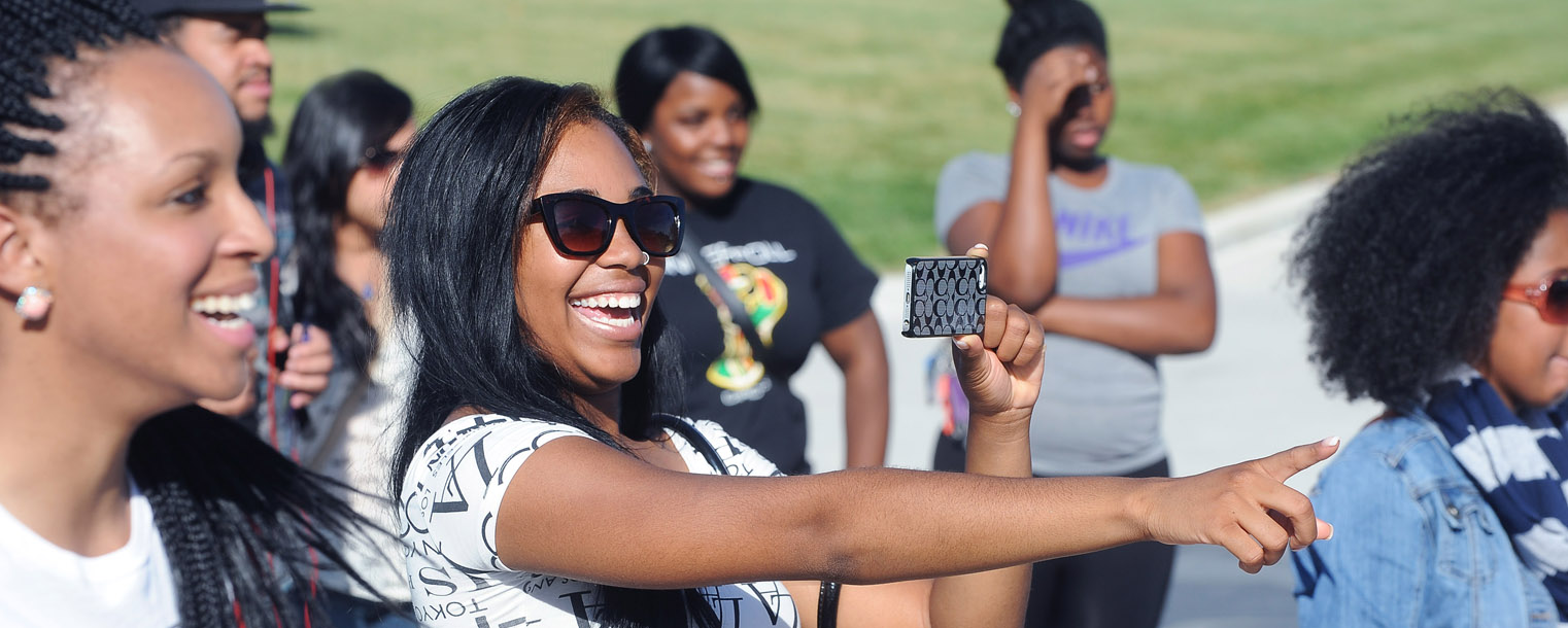 Kent State students enjoy the musical entertainment on the Student Green during the 32nd Annual Black Squirrel Festival.