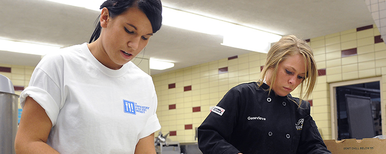 Kent State students prepare meals for those in need in the community as part of the Campus Kitchen at Kent State program.