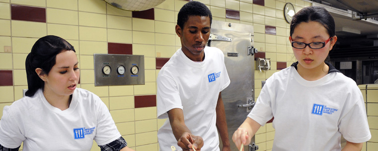 Kent State student volunteers make cookies as part of the Campus Kitchen at Kent State.