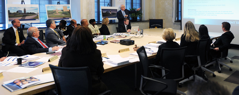 <p>Kent State University President Lester A. Lefton makes a point during a presentation to the Kent State University Board of Trustees meeting held in the main conference room of Kent State's Cleveland Urban Design Collaborative.</p>