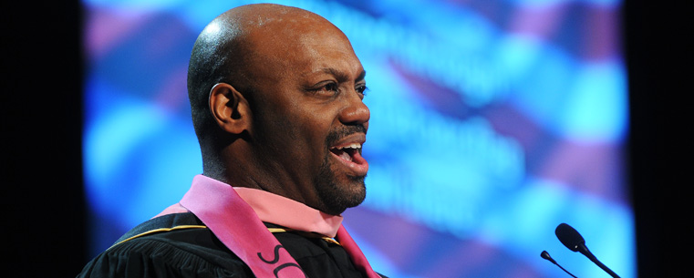 Darryl Lewis, of the School of Music, sings the National Anthem during the Saturday morning commencement ceremony.