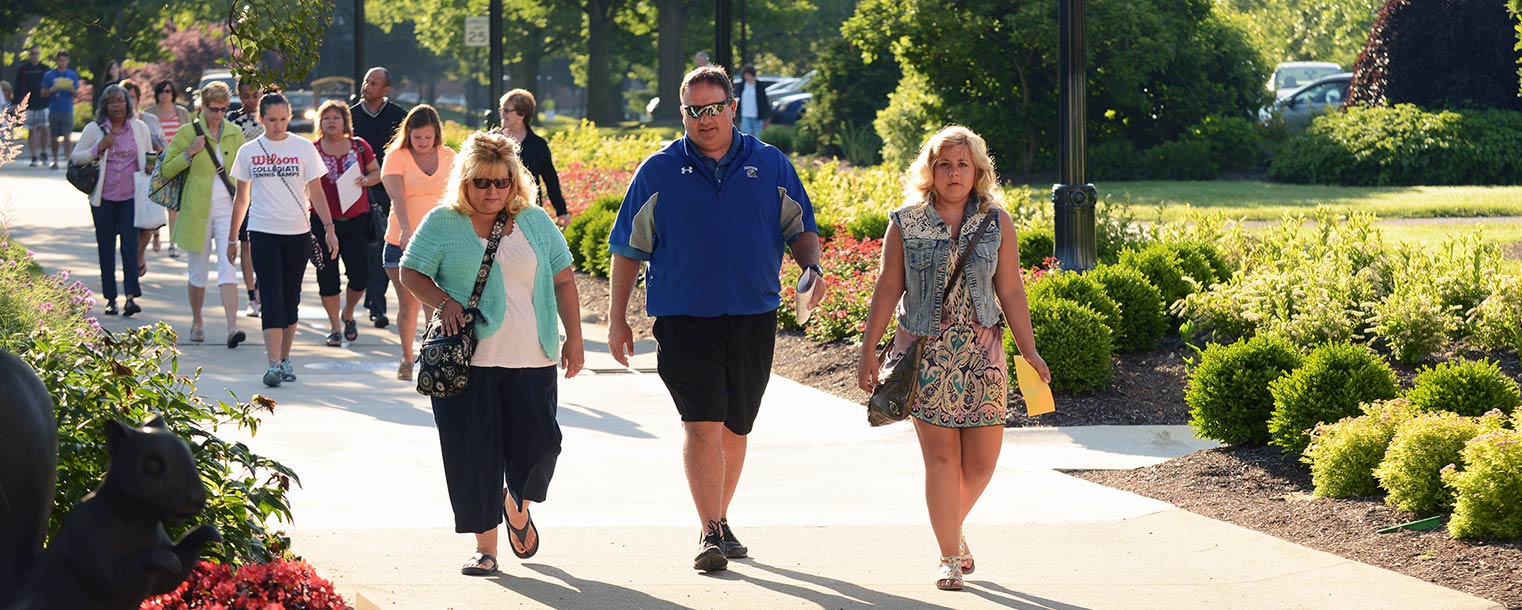 New Kent State students and their family members enjoy a walk across campus during a Destination Kent State visit to the Kent Campus.