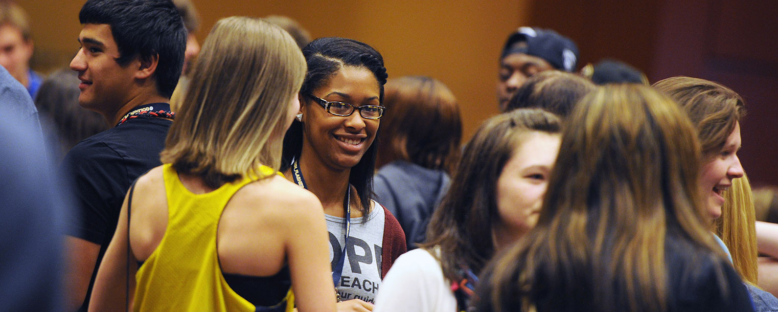 New Kent State students meet and greet one another following a Destination Kent State presentation in the Kent Student Center Ballroom.