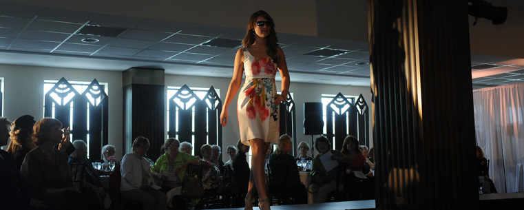 <p>A model walks the runway during a "Lunch With Kate" fashion show event held at Sammy's at Legacy Village.</p>