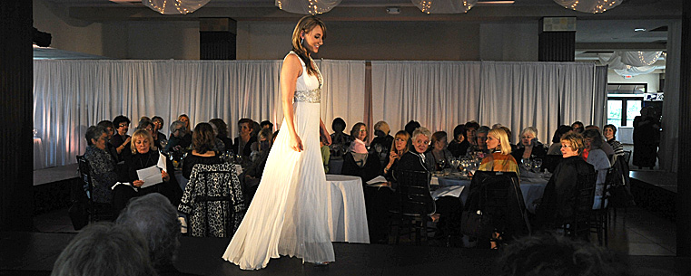 <p>A model walks the runway during a "Lunch With Kate" fashion show event held at Sammy's at Legacy Village.</p>