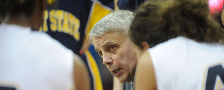 Bob Lindsay, who is in his 23rd year as Women's Basketball head coach, gives some pointers to his team during a game last year.