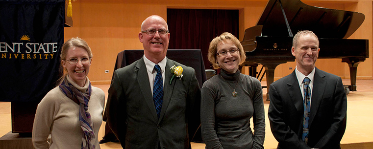 Three Kent State University faculty members were honored as the 2013 Outstanding Research and Scholar Award recipients. Award recipients (from left to right) Katherine Rawson, Department of Psychology; Michael Loderstedt, School of Art; and Carrie Schweitzer, Department of Geology, Kent State University at Stark, stand with Grant McGimpsey (far right), Kent State’s vice president for research.