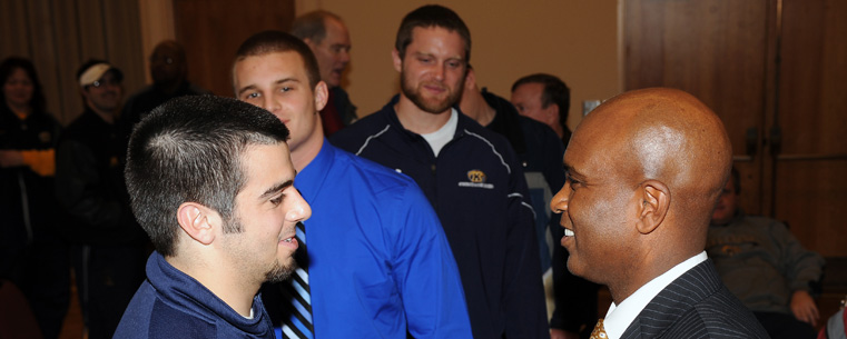 <p>Darrell Hazell meets current Kent State football players following a press conference in which he was named Kent State's 20th head football coach.</p>