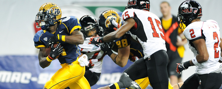 Kent State's Dri Archer runs for a 15-yard touchdown during the first half of Kent State’s appearance in the MAC Championship game in Detroit.