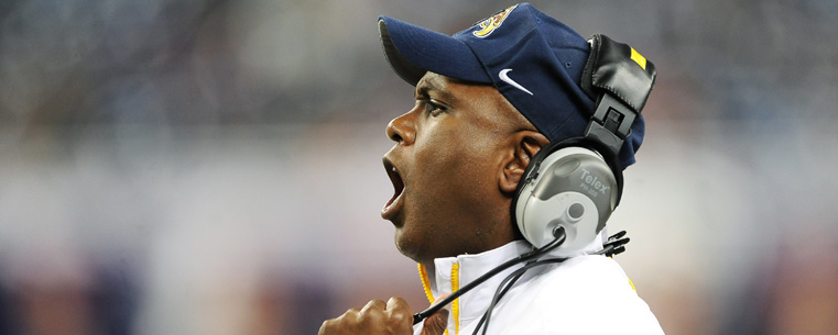 Kent State Head Coach Darrell Hazell yells to his players during the second half of Kent State’s appearance in the MAC Championship game in Detroit.