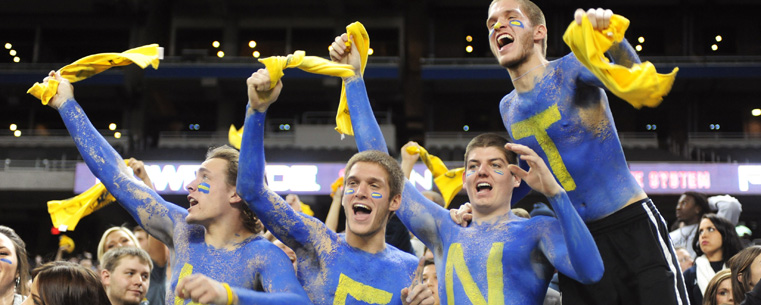 Kent State students cheer on the Golden Flashes during the MAC Championship game at Ford Field, in Detroit.