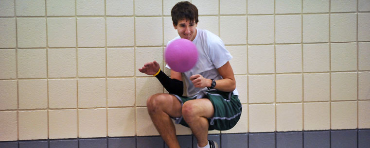 Kent State Dodgeball Club Captain Kyle Fitzpatrick is hit during a match in the Student Recreation and Wellness Center.