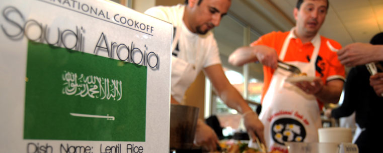 Members of Kent State's Indian community serve food during the International Cook-Off event.